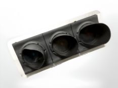 A wall mounted traffic light