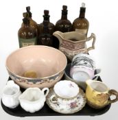 A group of antique chemists bottles, Sunderland lustre ware jug, further ceramics.
