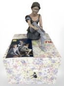A Spanish Elisa figure depicting a ballerina seated, height 28 cm, boxed.