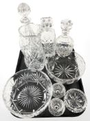 A tray of crystal including decanters, crystal bowls, a vase, etc.