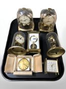 A group of vintage mantel clocks including Schatz, Smiths bedroom clock, etc.