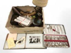 A box containing cloisonne bowl, wooden table lamp, a boomerang, an album of antique photographs,