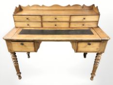 A 19th century pine writing desk, width 120 cm.