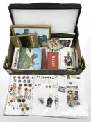 A group of continental pin badges, lapel badges, a Woodbine cigarettes domino set,