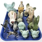 A group of porcelain animal figures to include a Beswick dapple grey foal figure, rabbit ornaments,