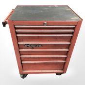 A Snap-On rolling tool chest containing a quantity of tools including Snap-On and others.