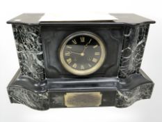 A Victorian black slate and green marble mantel clock, width 41 cm.