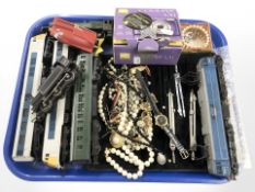 A tray of model railway locomotive engines, part draughtsman set, costume jewellery, etc.