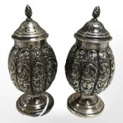 A pair of 19th century silver pepper pots, Birmingham, 1897, height 9.5 cm.
