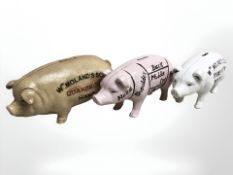Three pig money boxes.
