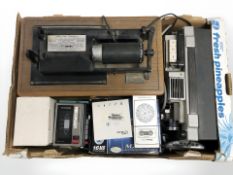 A small group of items including a digital camera, micro cassette recorder, part phonograph, etc.