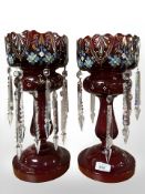 A pair of Victorian ruby glass lustres, height 36 cm.
