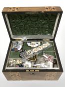 A Victorian parquetry inlaid sewing box with contents, width 24.5 cm.