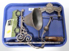 A reproduction toilet roll holder, together with a cast iron Land Rover bell on bracket.