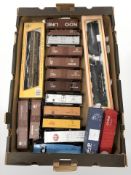 Two Mhano HO locomotive scale models, boxed, together with sixteen items of rolling stock.