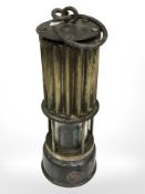 A Premier Lamp Company antique miners lamp.