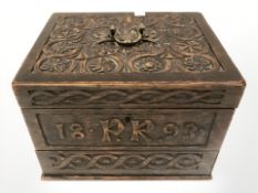 A 19th century carved oak jewellery box, fitted a drawer.