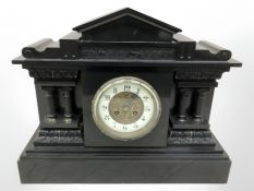 A Victorian black slate mantel clock, width 44 cm.