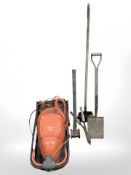 A Flymo lawn mower and a small quantity of gardening tools