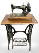 An antique treadle sewing machine,