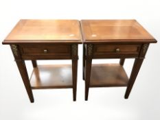 A pair of French-style brass-mounted bedside stands, both fitted a drawer, each 44 cm wide.