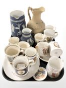 A group of commemorative china, Royal Doulton coronation mugs, Wedgwood blue and white jasperware,