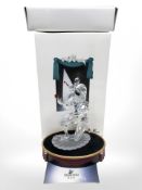 A Swarovski Collector's Society figure, Masquerade Harlqeuin, on plinth,