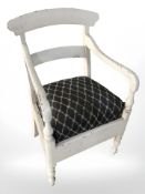 An antique painted armchair together with a 1960's swivel chair.