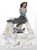 A Spanish Elisa figure depicting a lady seated, height 27 cm, boxed.