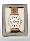 A Timberland gent's wristwatch on tan leather strap, in retail box.