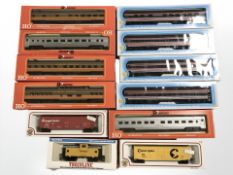 A group of HO scale Rivarossi, Bachmann and other carriages, Walthers rolling stock, etc.