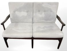 A contemporary Scandinavian two seater settee, width 134 cm.