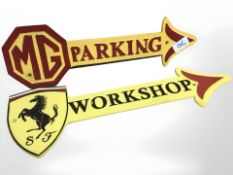 Two cast arrow car signs.