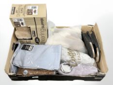 A box of new retail stock items to include sandals, shearling slippers, further clothing.