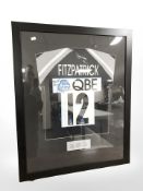 A signed Newcastle Falcons rugby shirt, season 2011/12, framed.