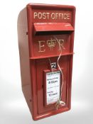 A reproduction pressed steel Post Office letter box.