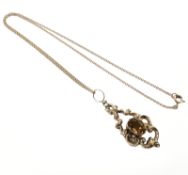 A late 19th century Citrine pendant mounted in yellow gold, suspended on 9ct gold chain, length 45.