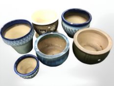 Six glazed pottery planters, average diameter 39 cm.