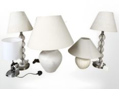 Five contemporary table lamps with shades.