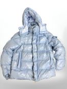 A Moncler blue puffer jacket. CONDITION REPORT: No size visible.