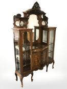 A Victorian inlaid mahogany sunk centered display cabinet, width 138 cm.