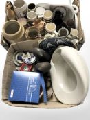 Two boxes of pottery including a William Row's stout bottle, ceramic mugs, cat figures, etc.
