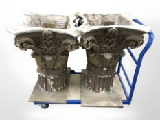 A pair of plaster classical style columns, approximate height 75 cm.