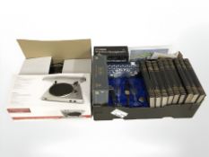 A box of Second Great War volumes, crystal glass, Trivial Pursuit game, a USB turntable.