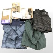 A quantity of new stock items including a gents Karrimor XXL coat, new with tags,