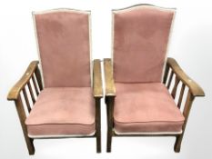 A pair of oak fireside adjustable chairs.