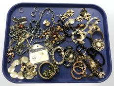 A group of costume jewellery, rings, necklaces etc.