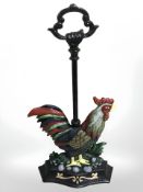 A cockerel door stop with handle.
