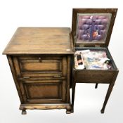 A reproduction oak cabinet,