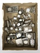 A large quantity of miniature novelty clocks, guitars, golf clubs, pillar box, Beetle car, etc.